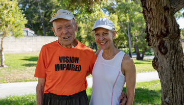 Image of Morland Smith and his daughter Cathy Middelton standing on the path ready for a run