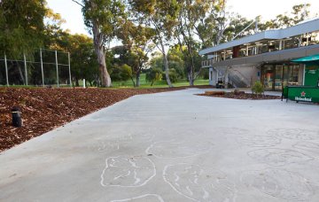 Sandblasted artworks on the path leading to the Driving Range