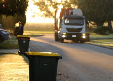 Image rubbish bins and rubbish truck. 