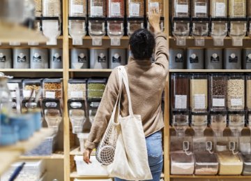 Image of woman food shopping.